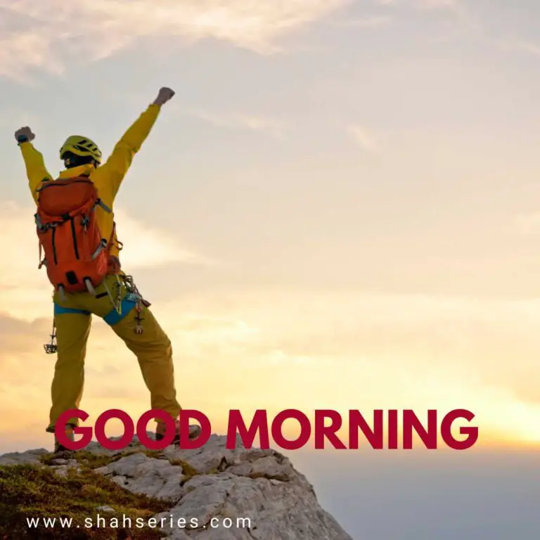 a guy climbs mountain in morning