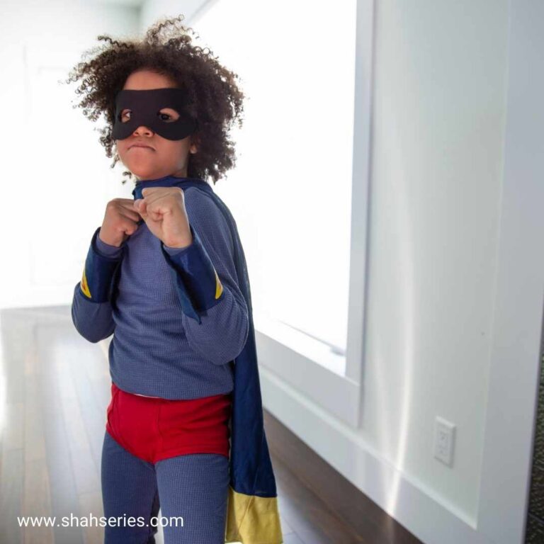 little boy dressed like superman